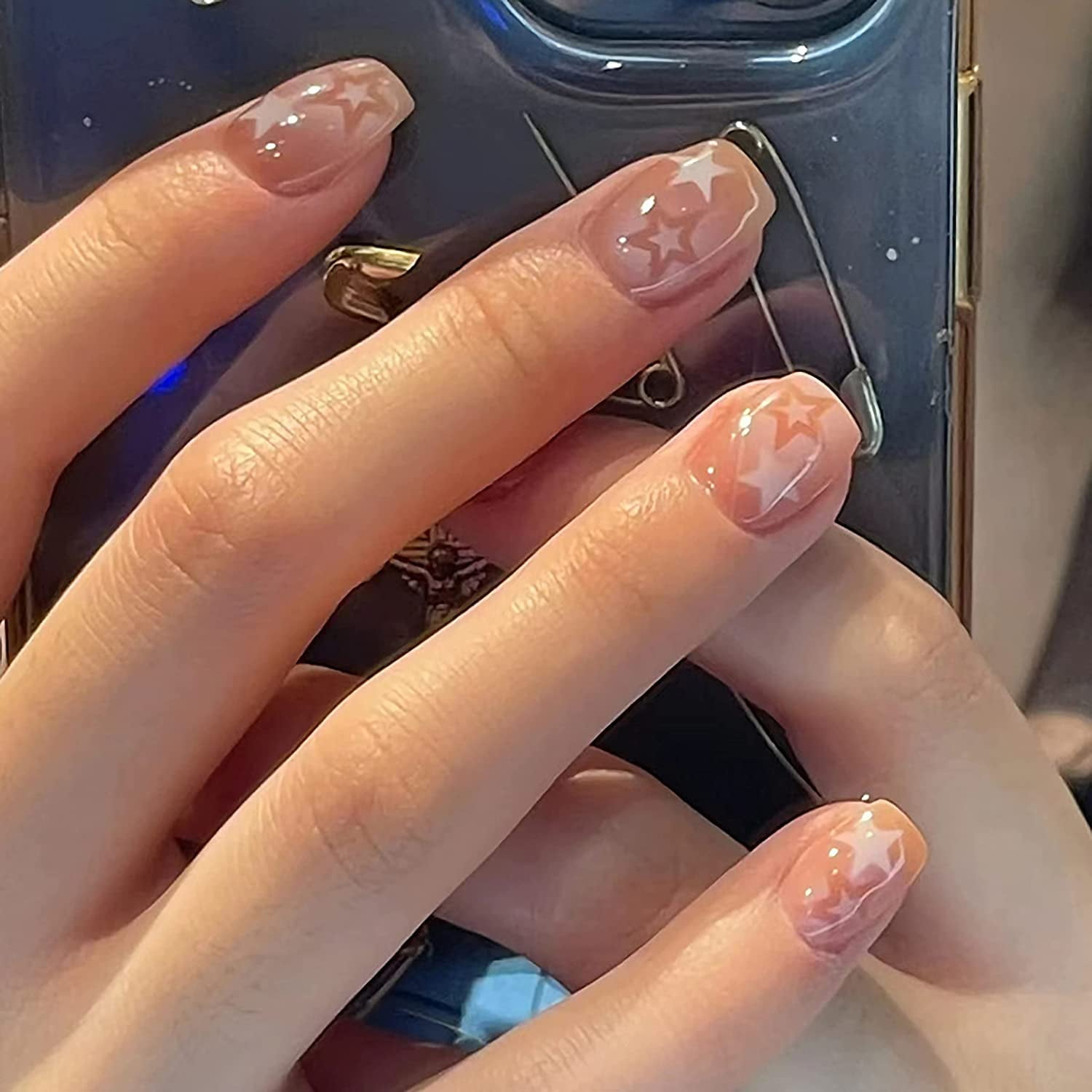 creative y2k star nails short looks