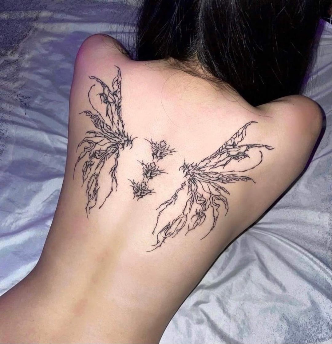 y2k inspired back tattoo trends